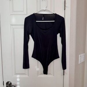 Never worn Skims Black jelly sheer long sleeve bodysuit in XL
